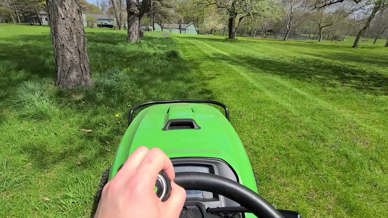 John Deere x739 mowing
