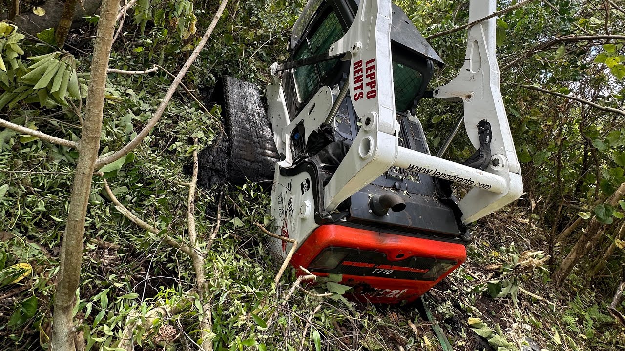 Skid Steer Stuck, can we get it out with the jeep??