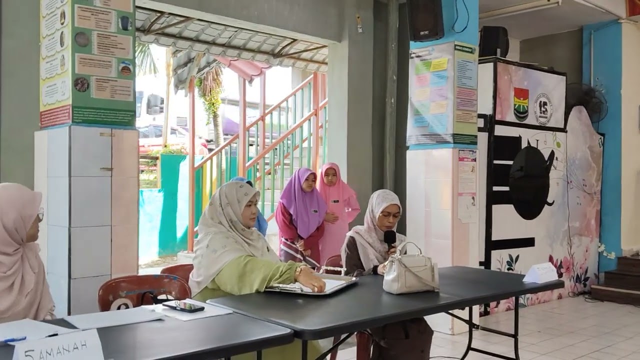 Majlis penyerahan slip keputusan ujian penilaian kelas KAFA (UPKK) calon 2025 peringkat SK Paroi 