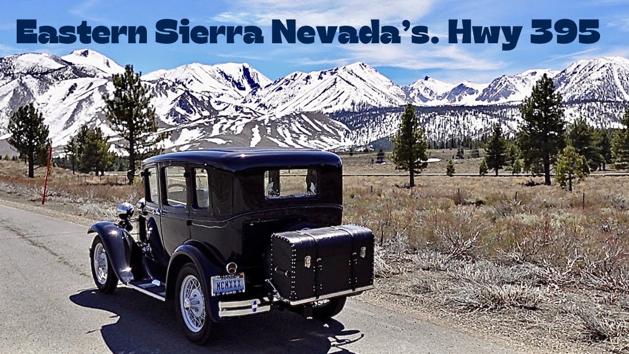 Model A Ford driving beautiful Eastern Sierra Nevada's Mountains. Enjoying California Highway 395