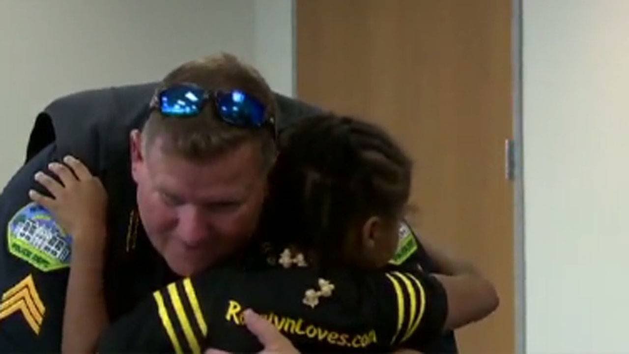Girl on a mission to hug cops across country
