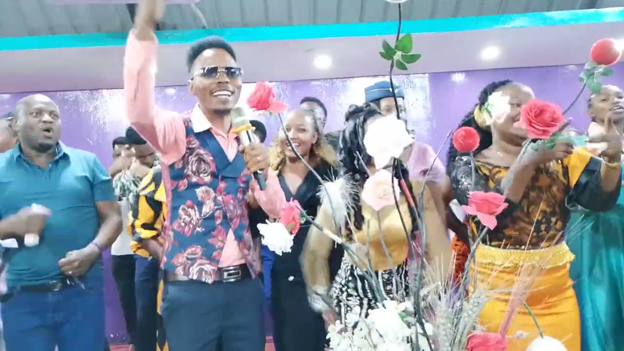STEPHEN KASOLO PERFORMING LIVE DURING LIZ MUSASI LAUNCH 