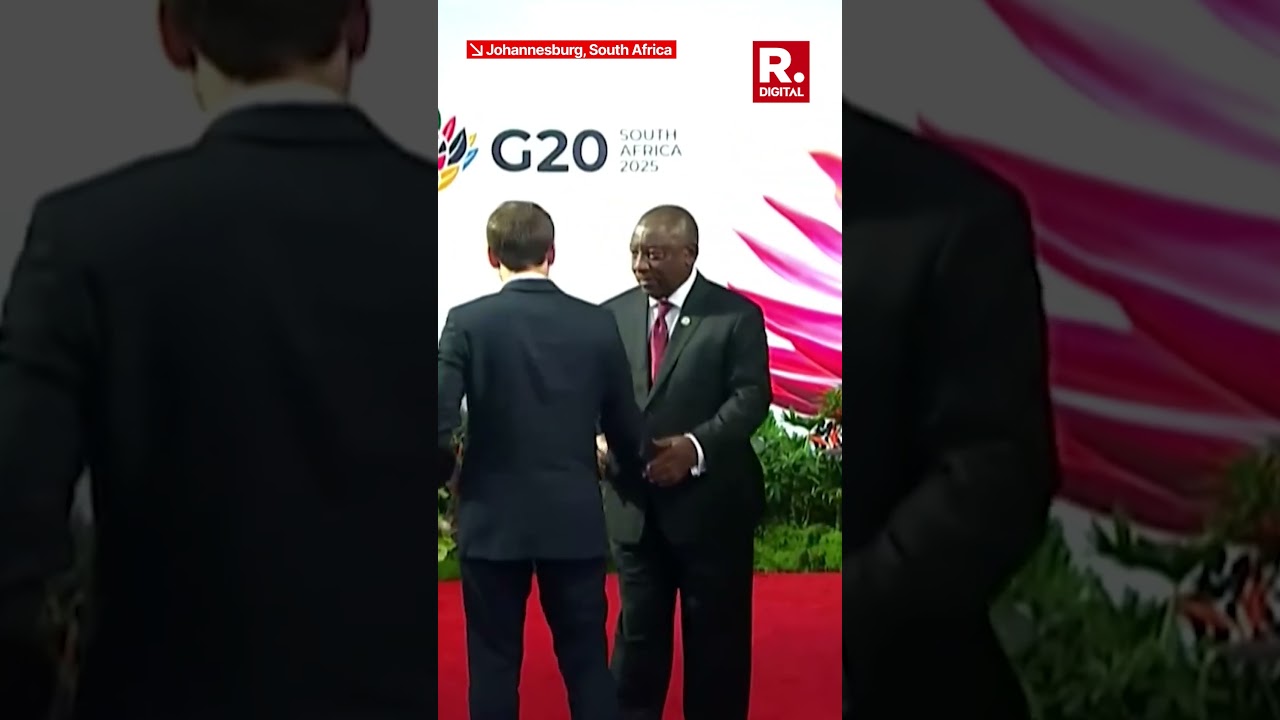 Emmanuel Macron Struggles With Outfit on Arrival at G20 Summit