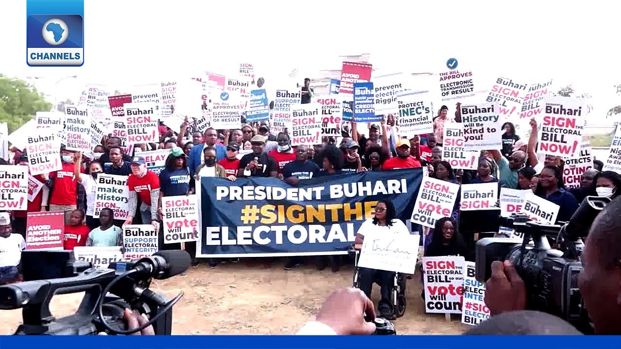 Groups Protest In Abuja, Demand Presidential Assent To Electoral Bill