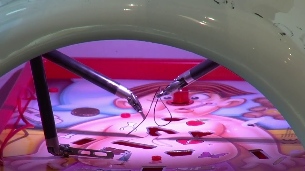 Students try robotic surgical equipment to learn about medical careers