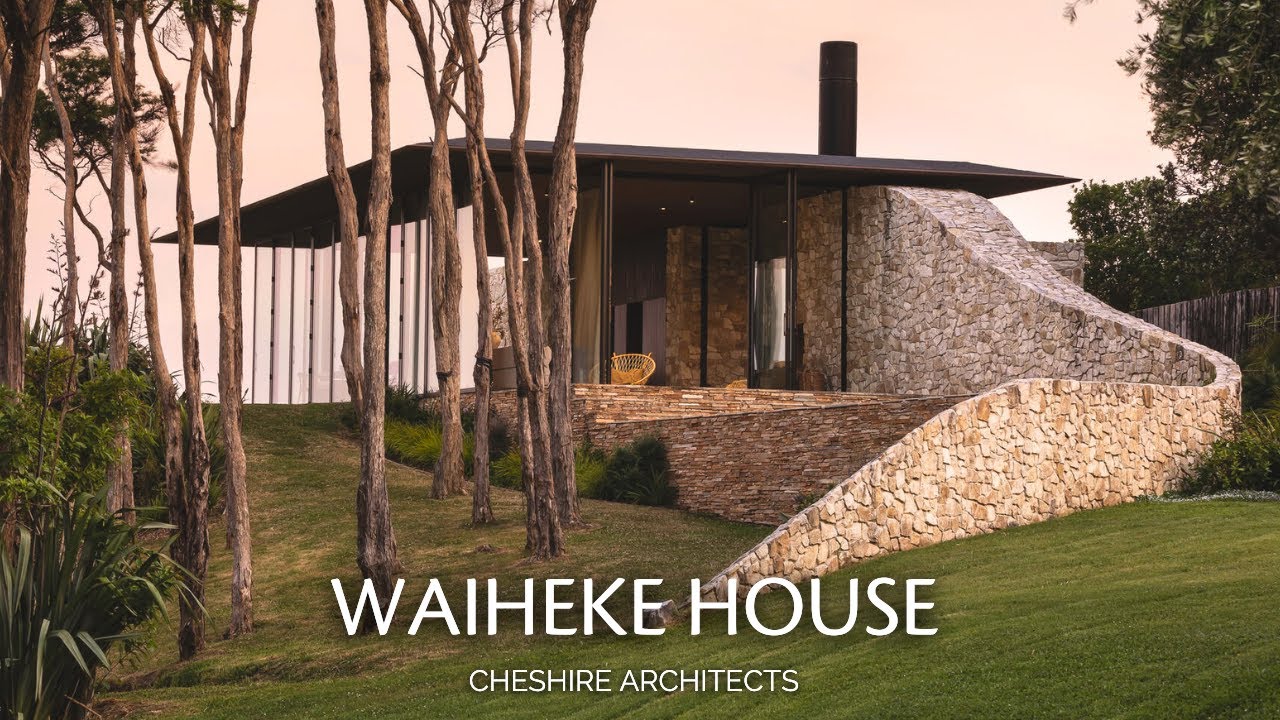 Stone Wall Emerges to Become the Central Spine of Waiheke House