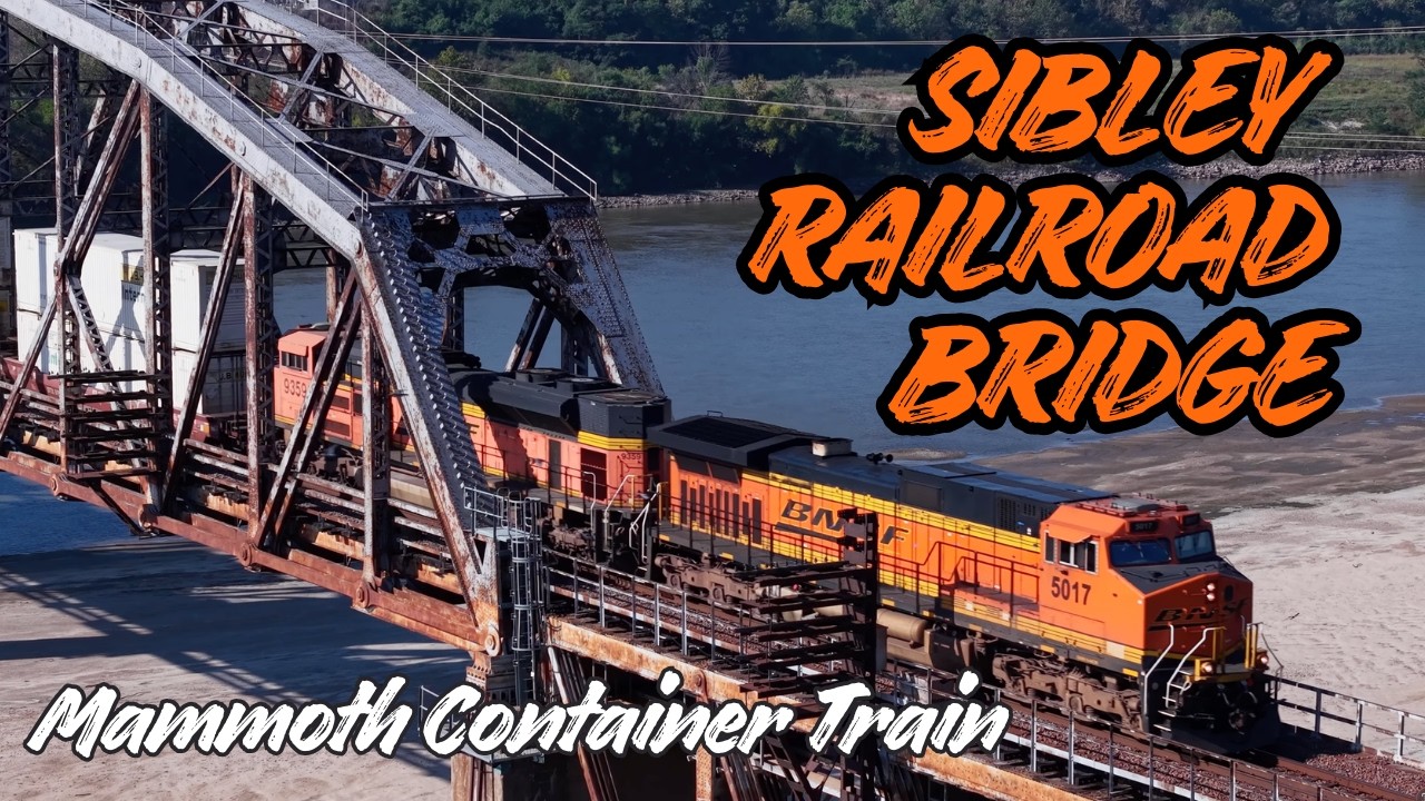 Doublestack train exits the Sibley Bridge and rounds the curve east towards CA Junction