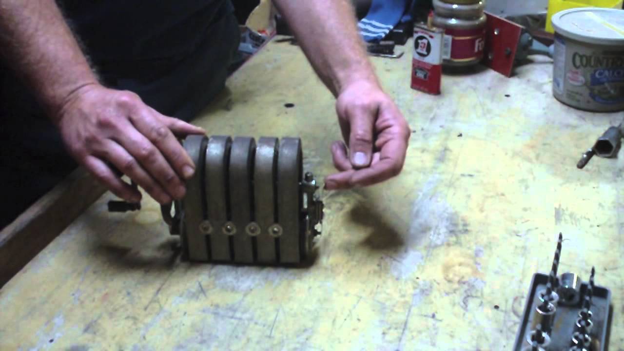 Antique telephone magneto or generator.