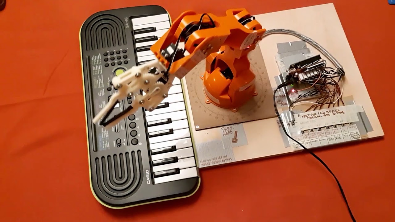 Arduino & Braccio Robot arm playing a couple of Xmas tunes