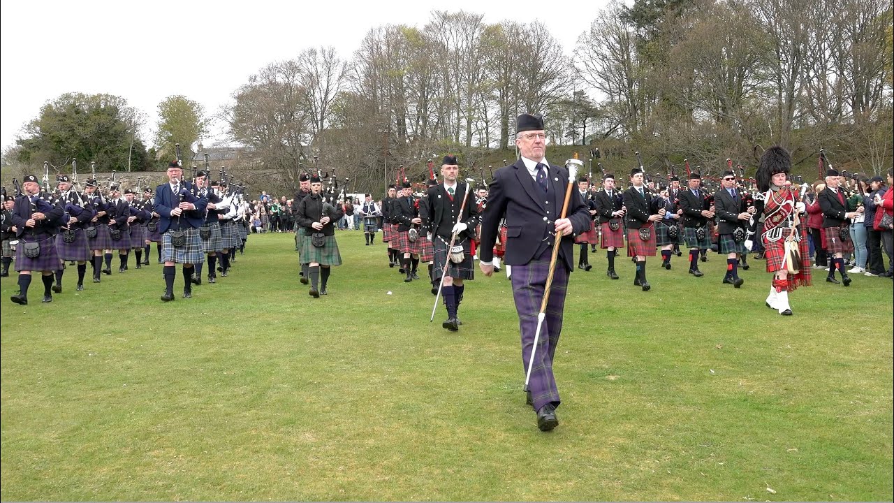 Farewell to the Creeks by Massed Pipe Bands of the Scottish Highlands at Alness Scotland April 2023