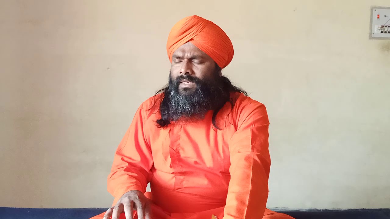 ACHARYA PURNADEVANANDA AVADHUTA SINGING PRABHATA SAMGIITA