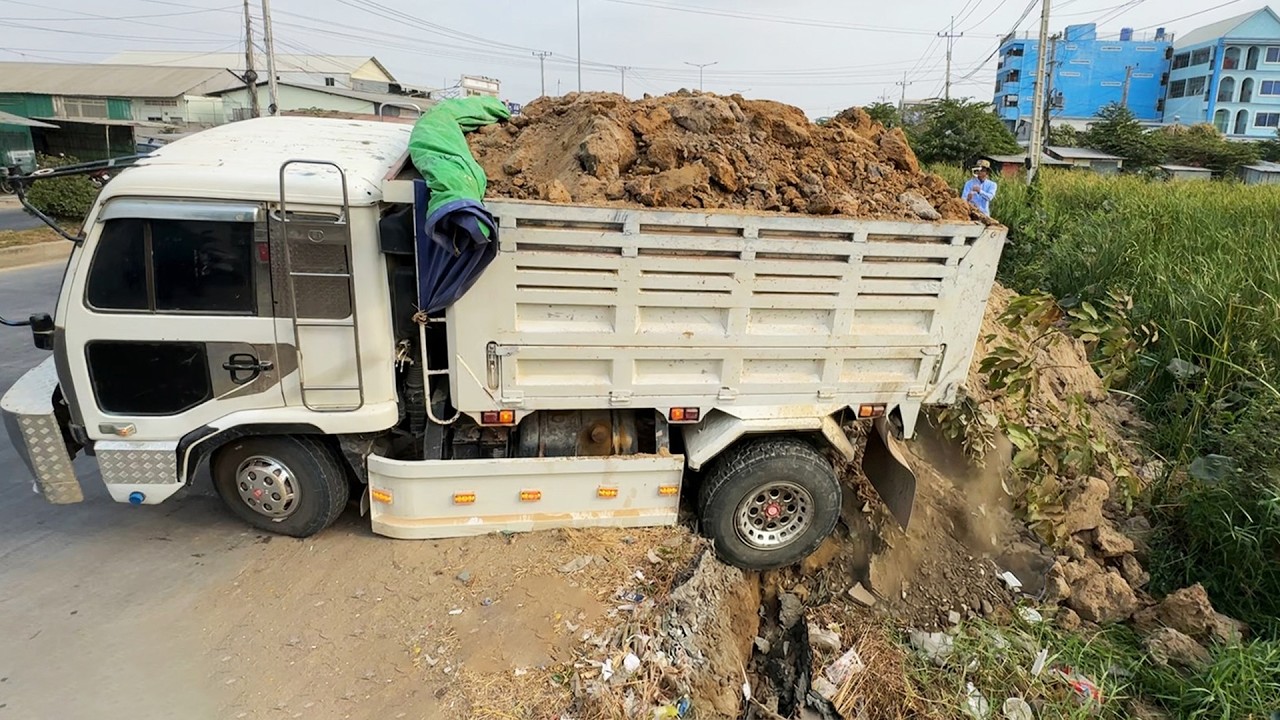 WOW Nicely Process!! Talented team NISSAN Trucks filling the huge land & pushing by D31P Dozer