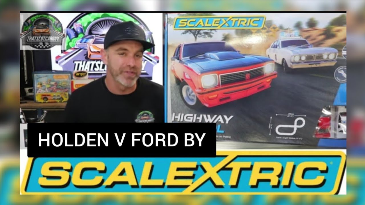 SCALEXTRIC LATEST SLOT CAR SET, ITS HOLDEN V FORD