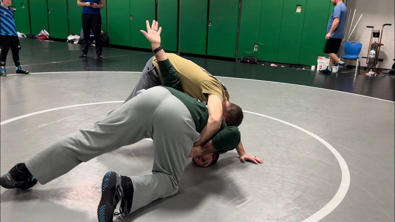 Bottom Wrestling- sit out, turn in, out back door and Peterson