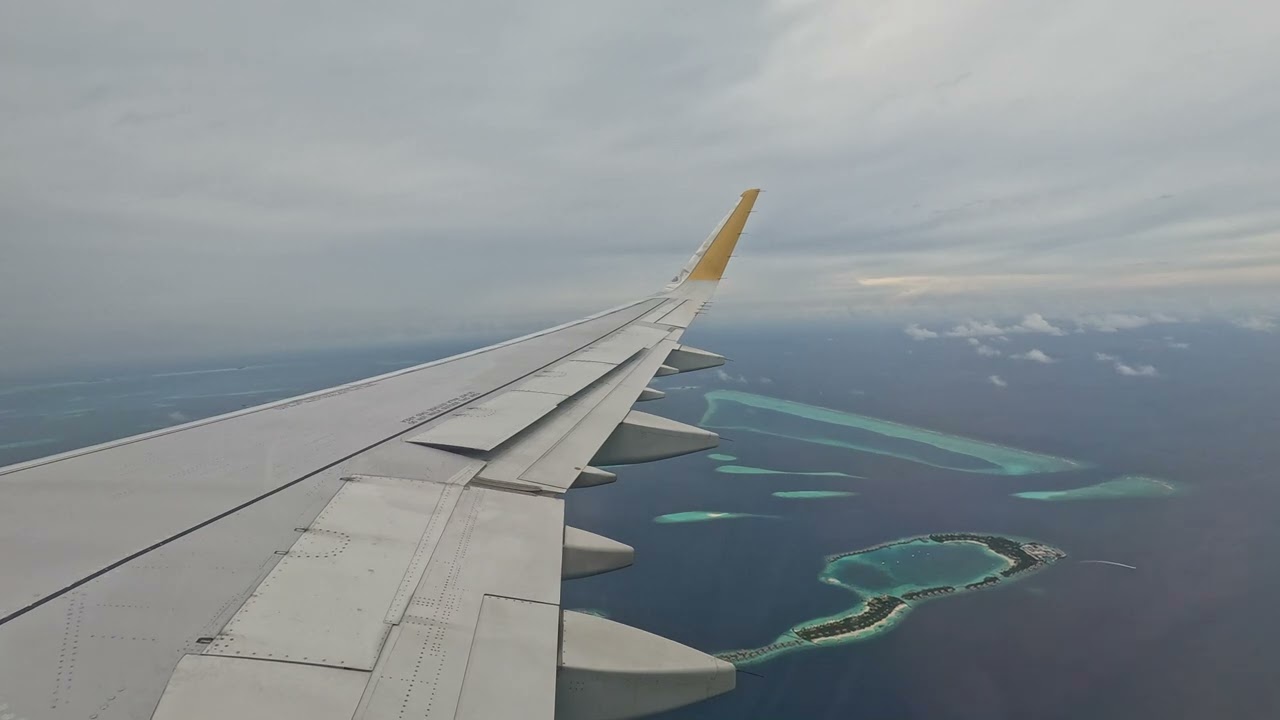 Abu Dhabi flight to Male , Maldives. Enjoy the views of Maldives island from high above.