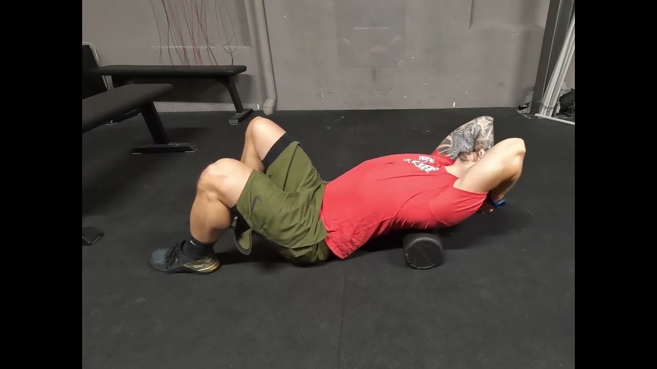Thoracic Rotation over Foam Roller -  dynamisch