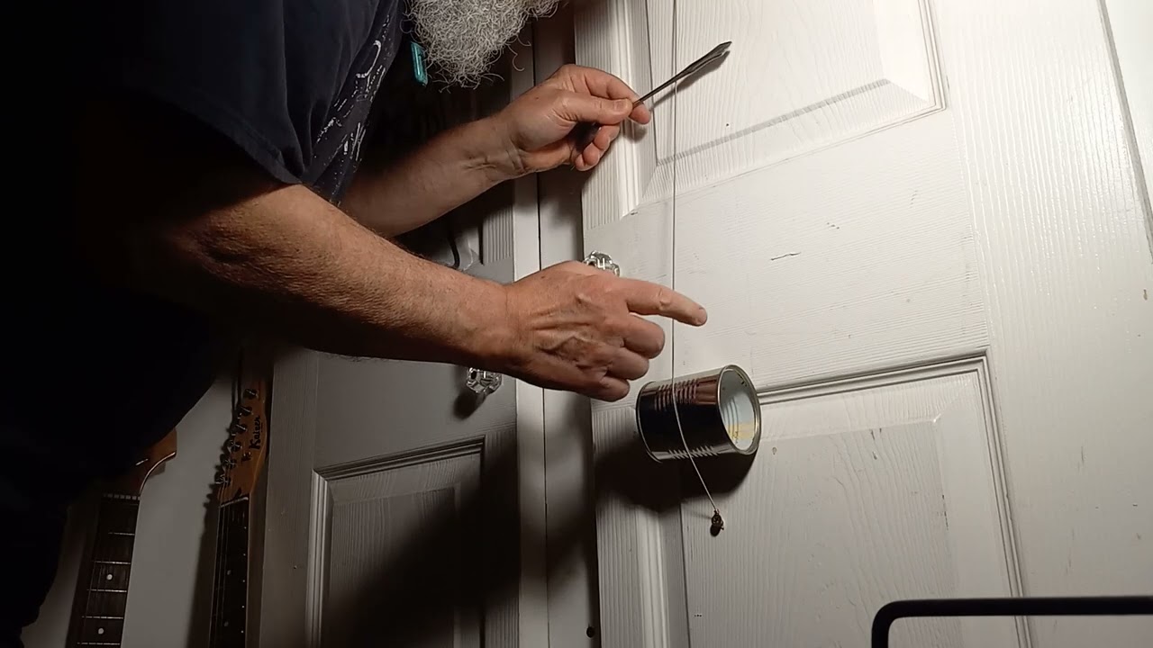 Diddley Bow W. Can on a Hollow Core Door