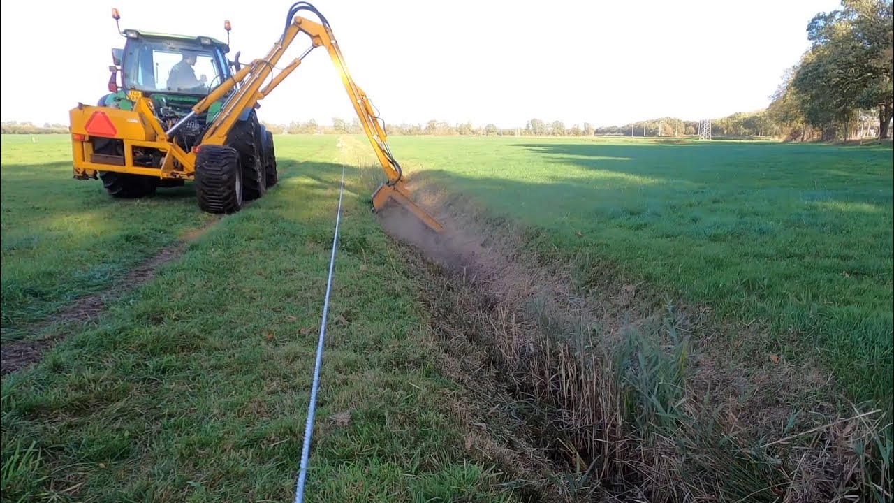 Mowing ditches with a Hemos flail mower