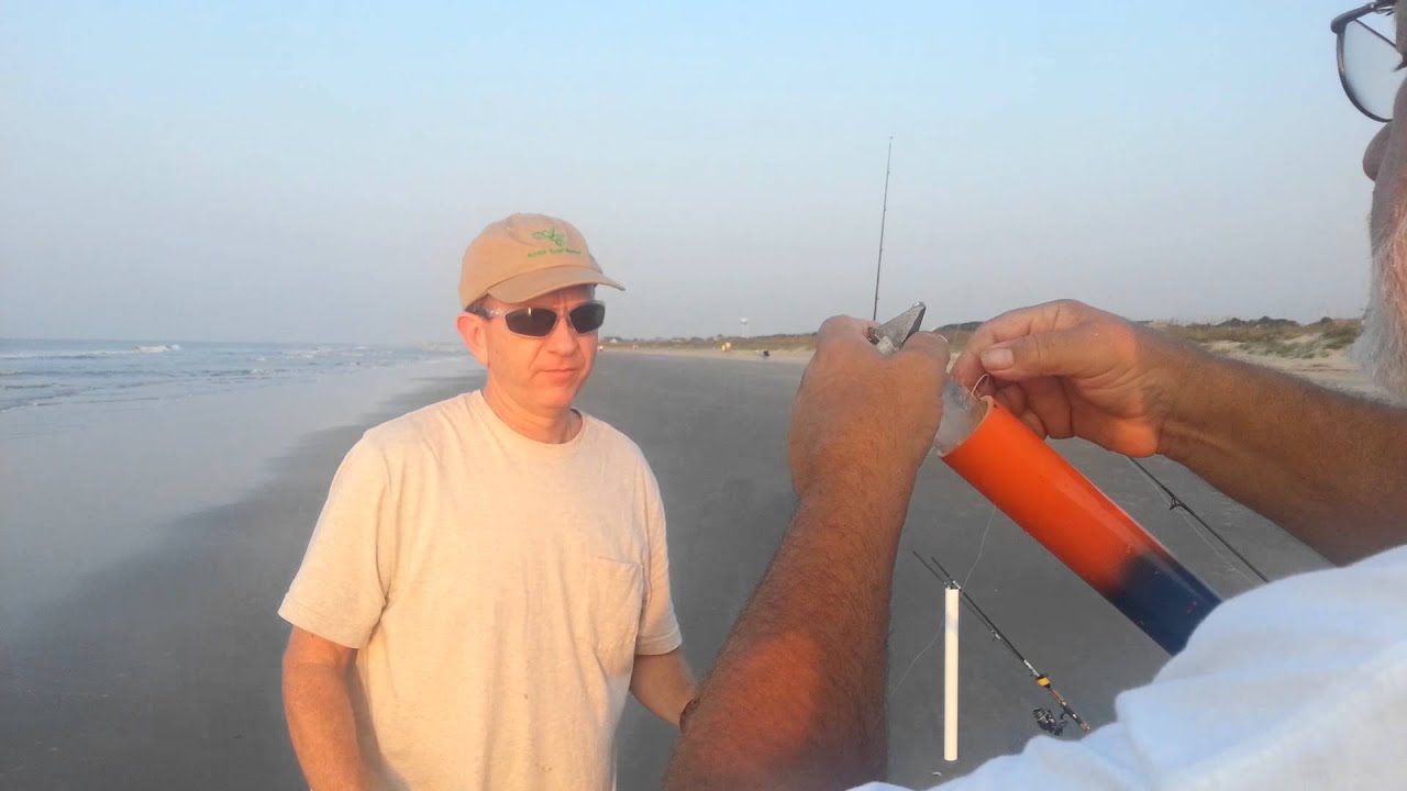 Family using home made bait launcher