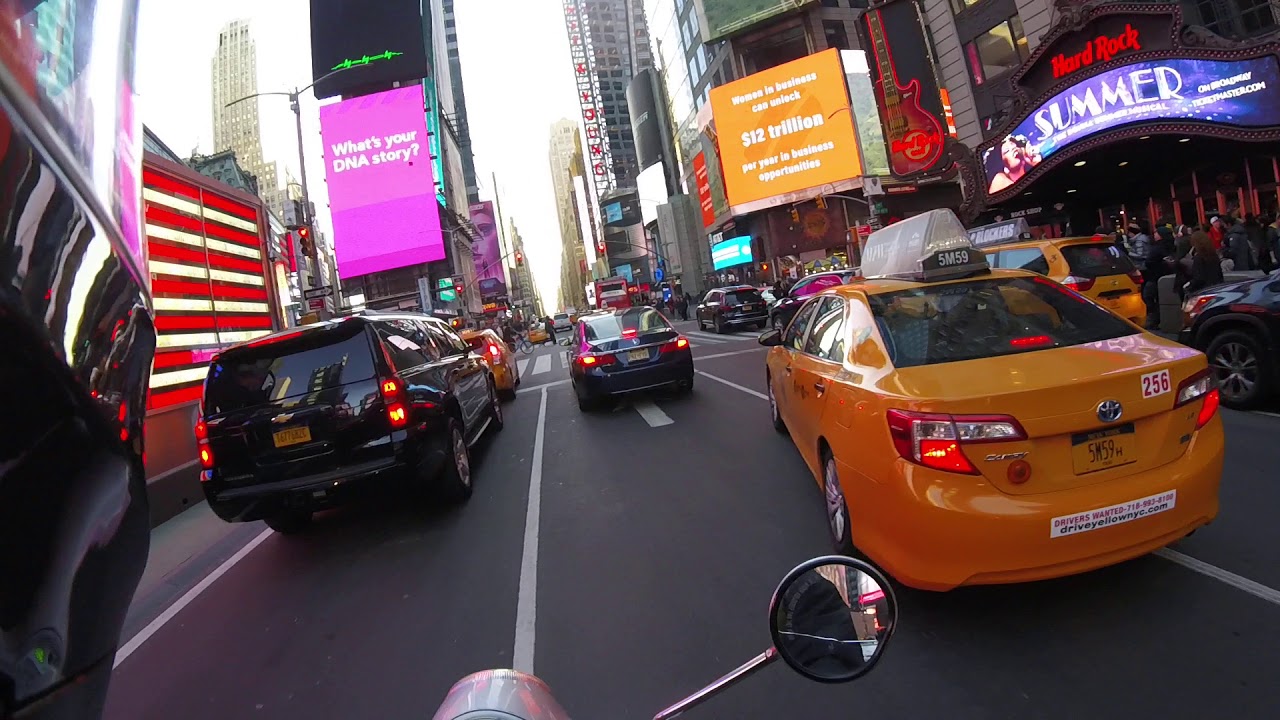 Skateboarding in Times Square 2/3