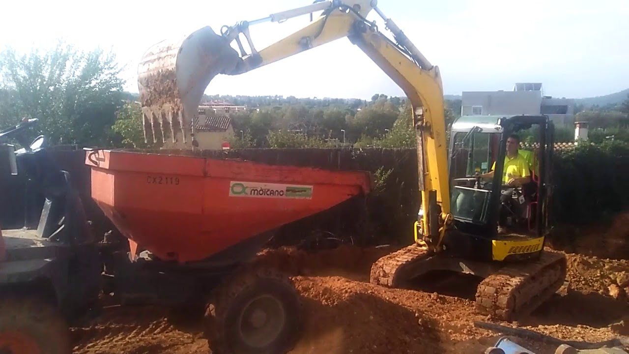 Rebaje de rampa acceso parking casa con yanmar vio55 y dumper articulado hidrostatico Ausa D350 AHG
