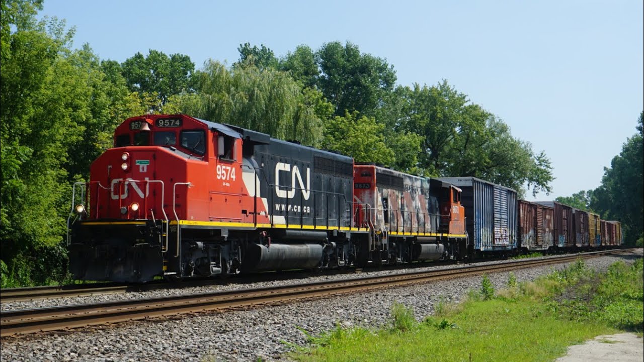 Afternoon trains at Neenah, WI Ft CN 100 leader on M357!