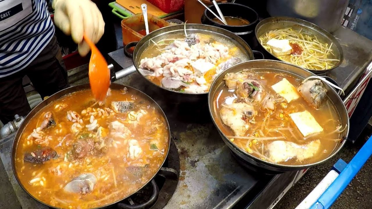 Seoul Street Food, Korea. Fish Soup, 'Hotteok' and 'Susubukkumi' Pancakes. Gwangjang Food Market