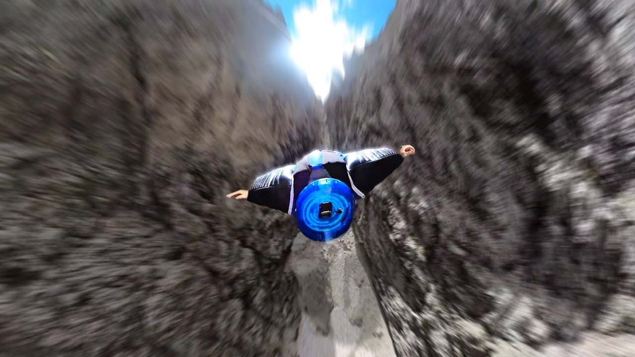 Flying through a Narrow Mountain Gap