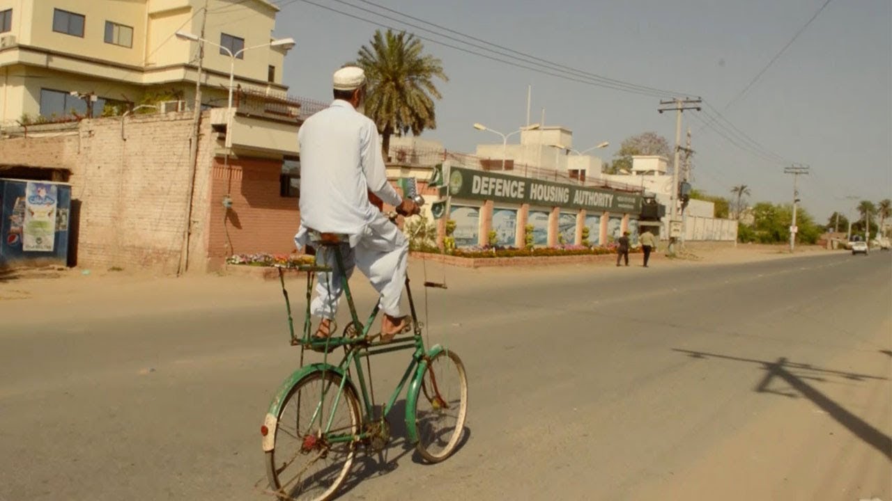 Guy Rides Double Decker Bicycle