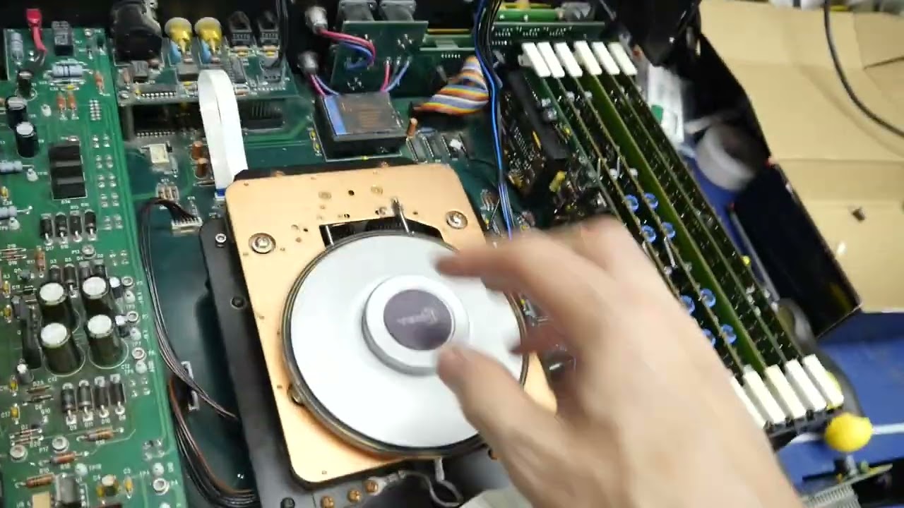 How to defeat the sensors to service CD transport in a Krell KPS25s