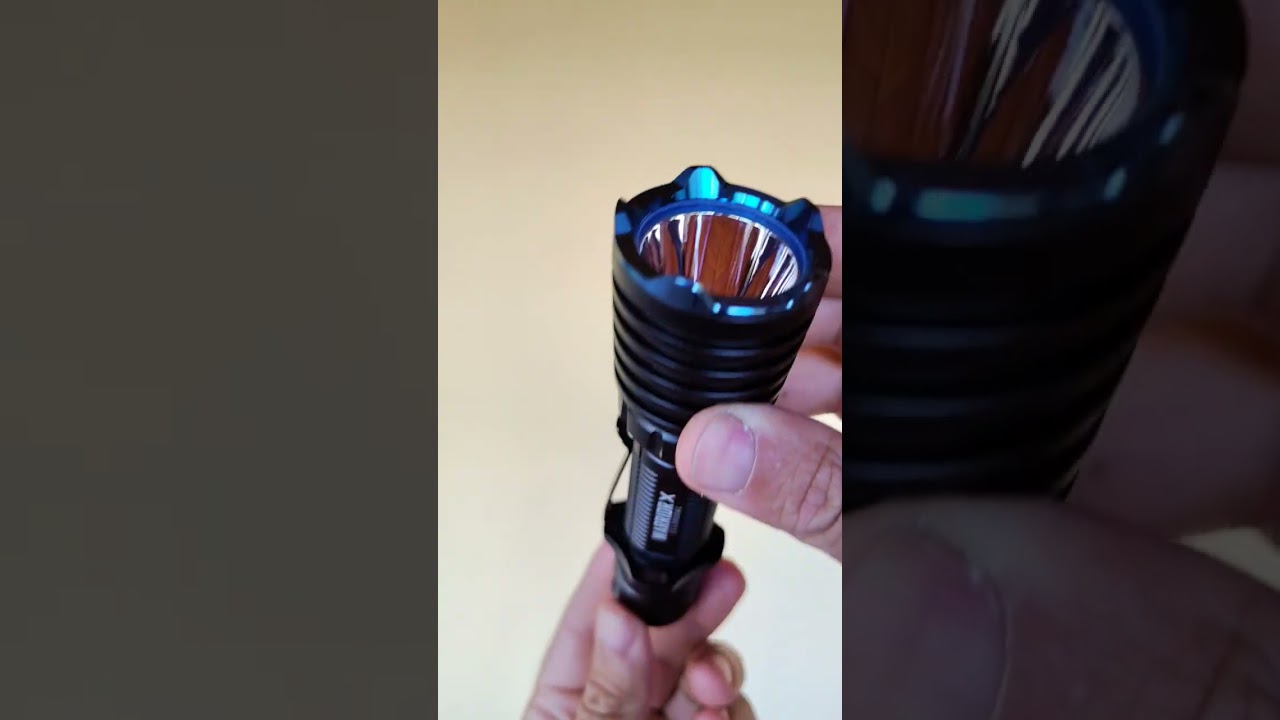 Olight Warrior X - tactical light with neutral white tint