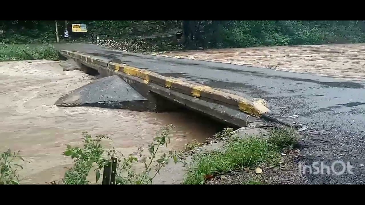 flat bridge river is about to flood