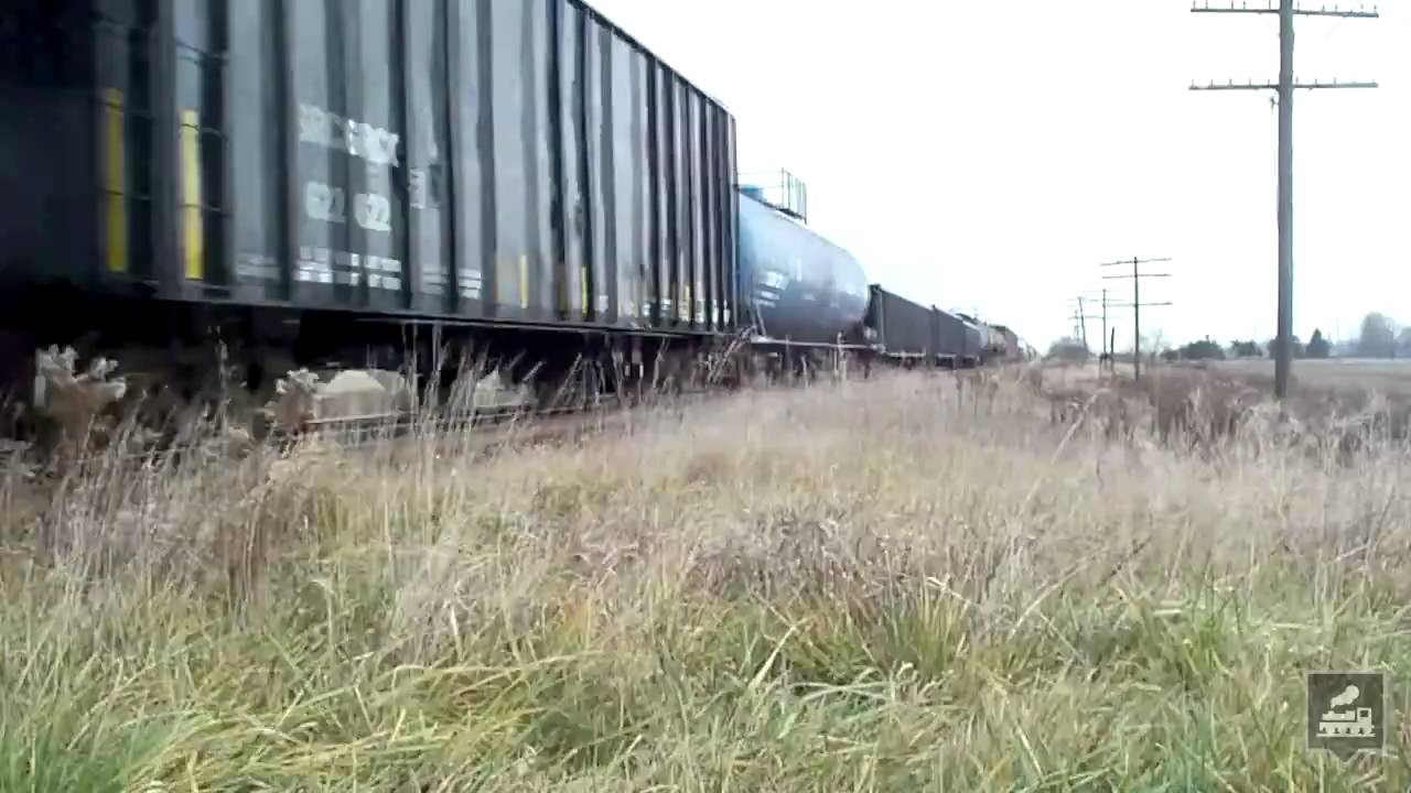 Speedy Freight Train at Unprotected Crossing