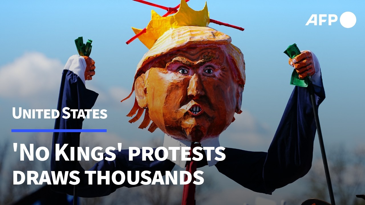 Giant blow-up doll mocks Trump at 'No Kings' rally in Washington | AFP