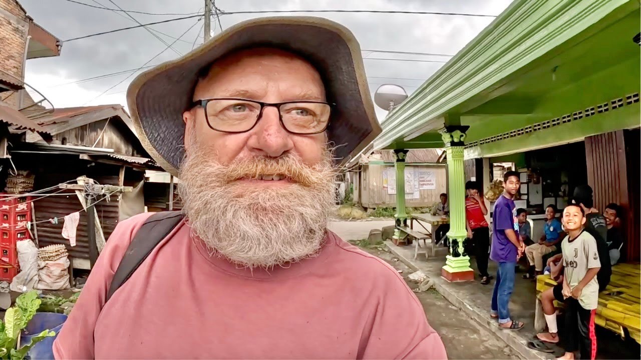 Locals shocked to see a foreigner in their village.Sumatra, Indonesia.
