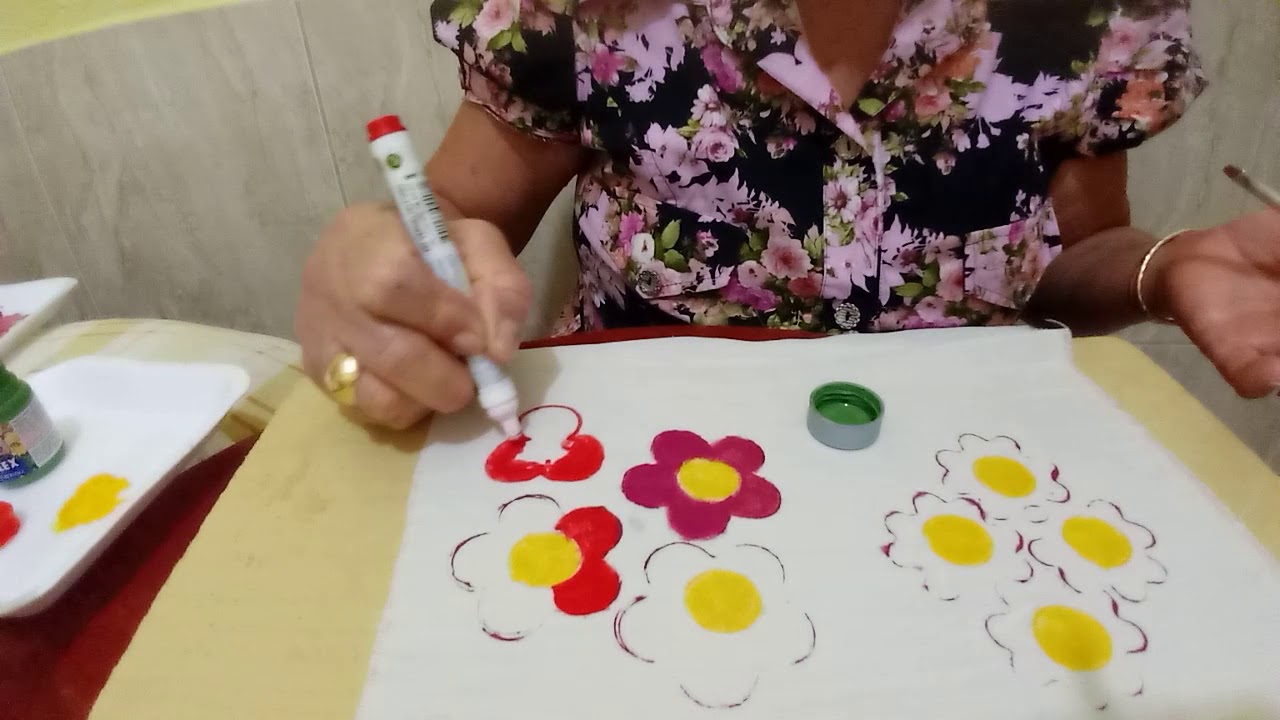 Pintando flores com medidores.