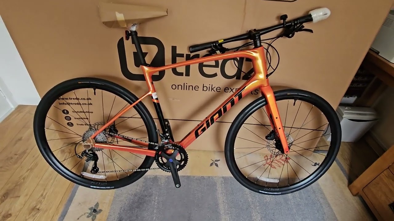 Unboxing Giant FastRoad Advanced 2 Helios Orange.  From Tredz.