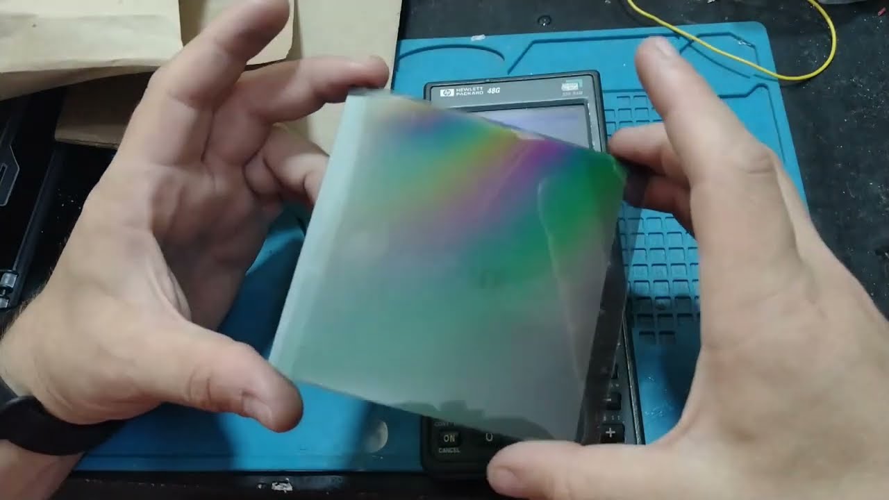 Porque fizeram essa Calculadora HP 48G  tão difícil de abrir?