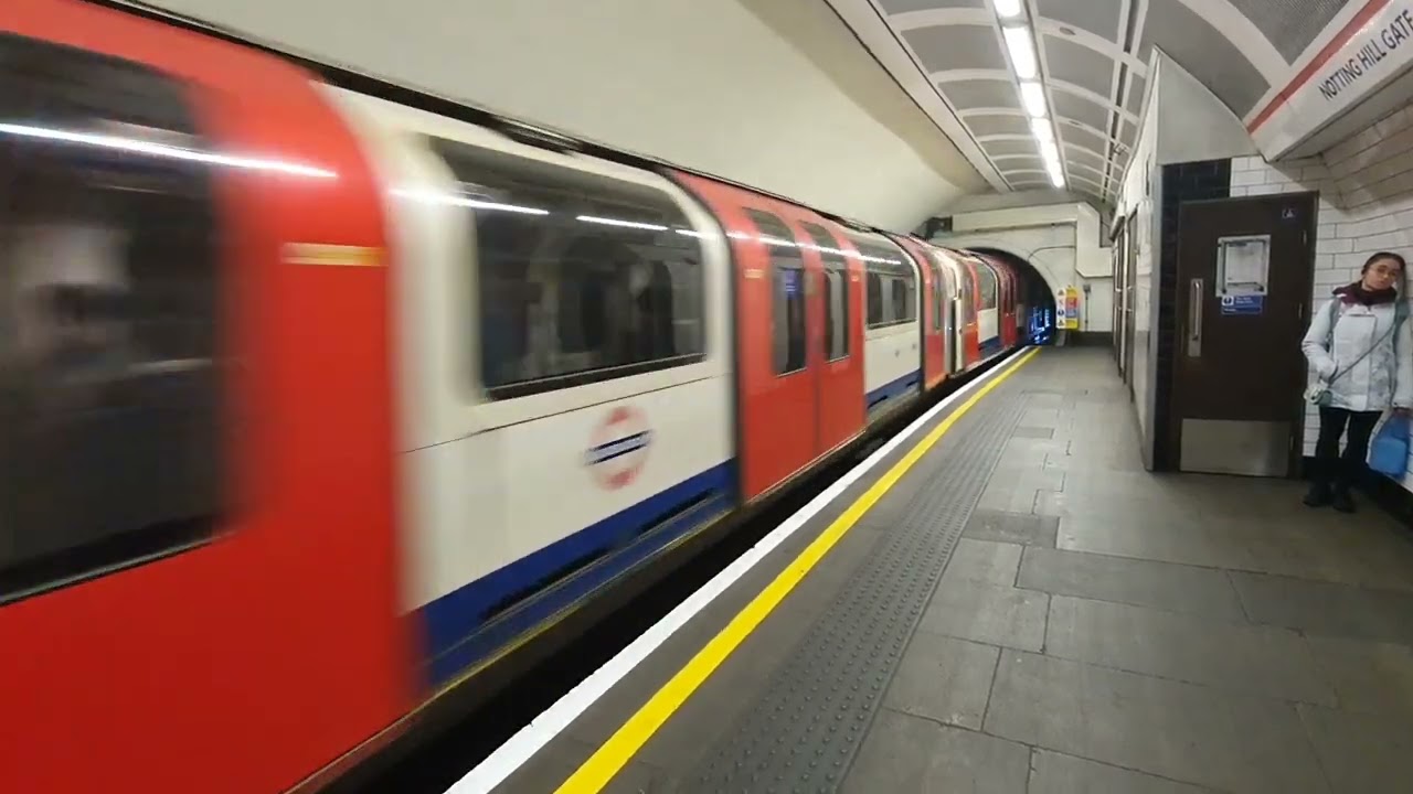 Central line 1992 Stock Arriving At Notting Hill Gate