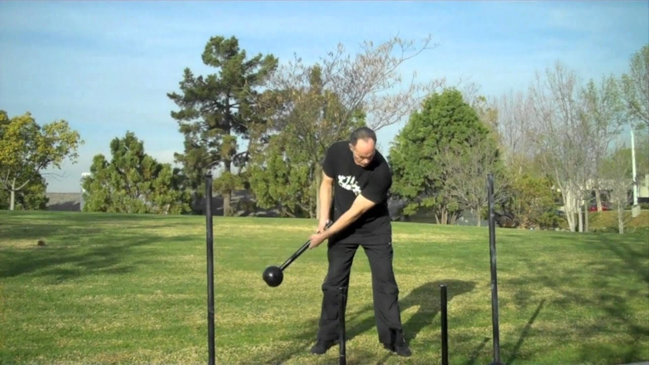 Macebell Exercise: 2-Handed Mill with a Short Mace by Rik Brown