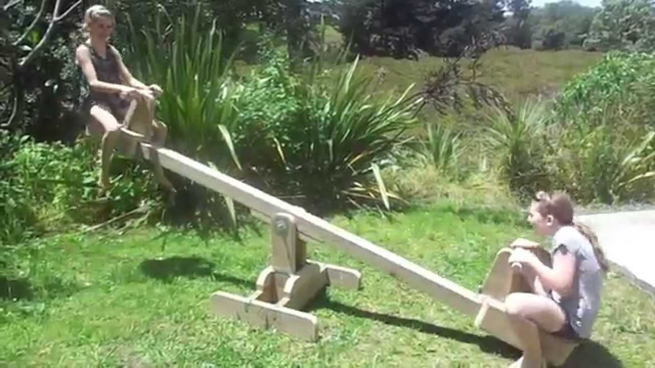 Seesaw with sliding seats