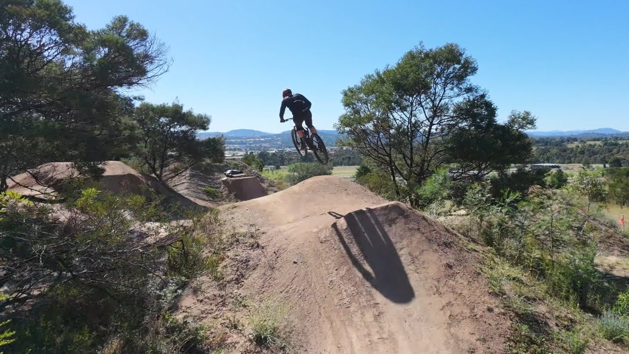 Stromlo mountain biking 'Hillfire green' jump trail drone follow cam Stromlo MTB