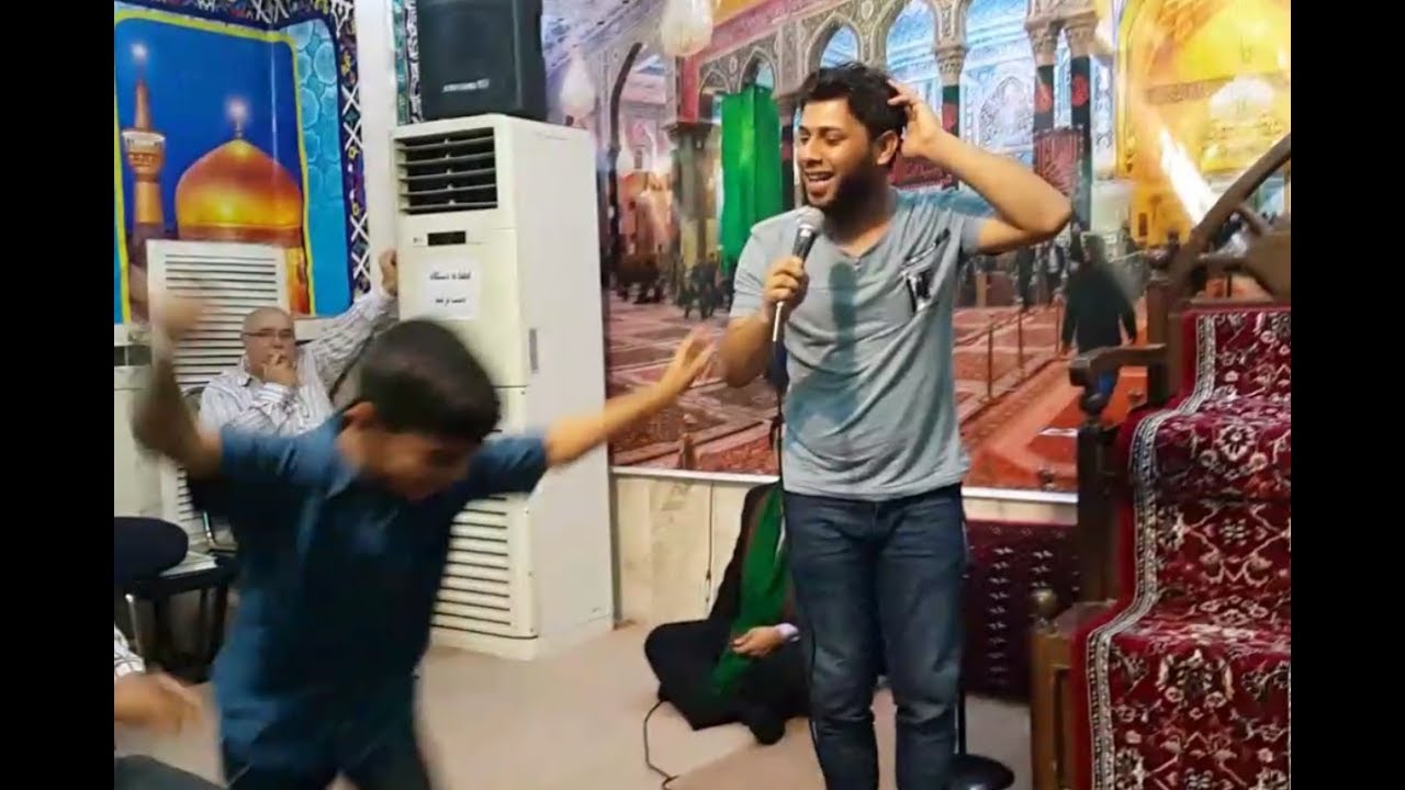 سيد فاقد يهوس مع طفل عراقي متاكد اذا ماضحكة راح تبتسم 😅في ايران مولد الامام الرضا