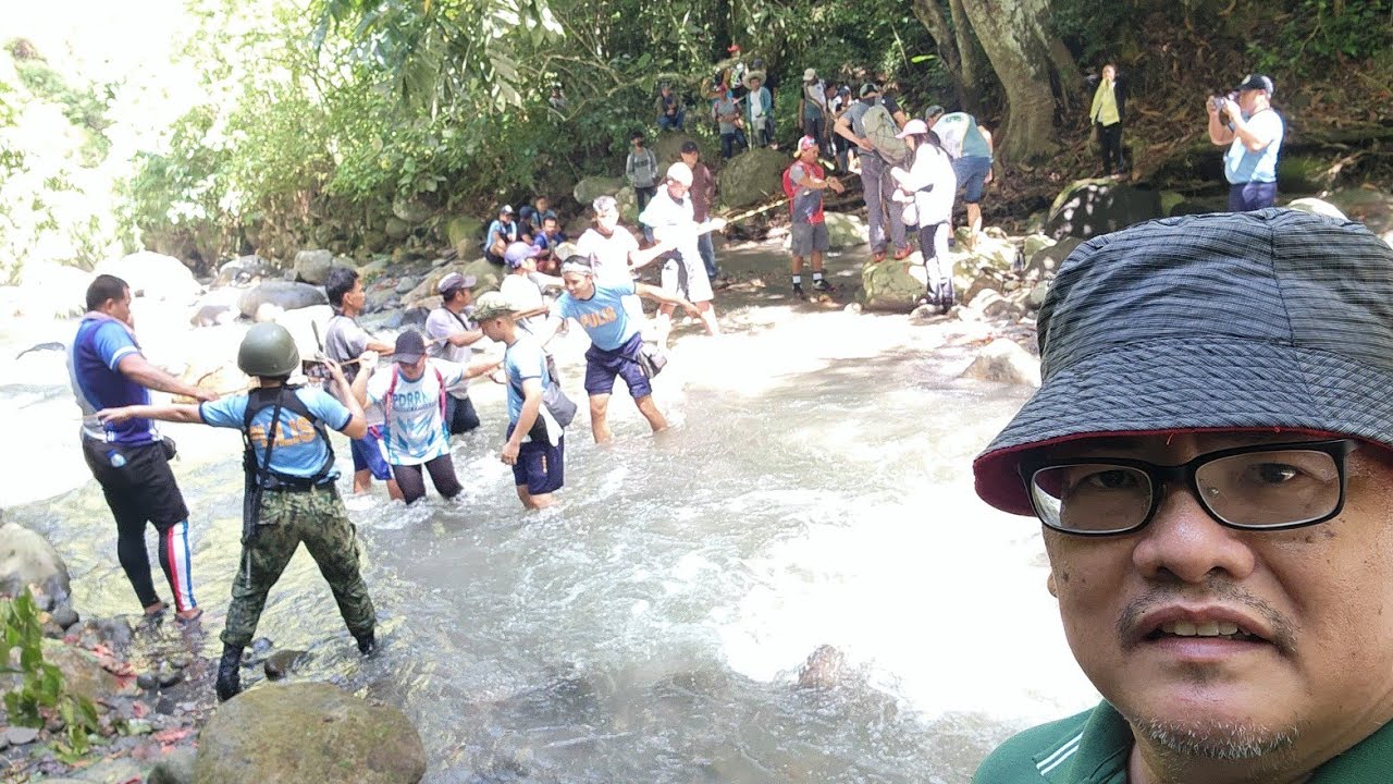 RIVER CROSSING IN THE MOUNTAINOUS HINTERLANDS OF TAMPAKAN, SOUTH COTABATO 