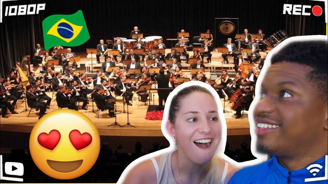 🇧🇷 A ORQUESTRA BRASILEIRA QUE DEIXOU A GRINGA DE BOCA ABERTA!! 😱😱🤯🤯🎶 (Reação)