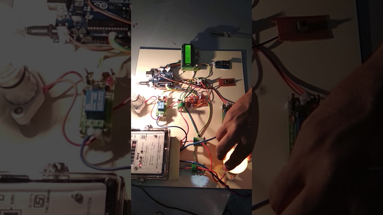IoT Based Smart Grid System for Load Monitoring and Load Balancing