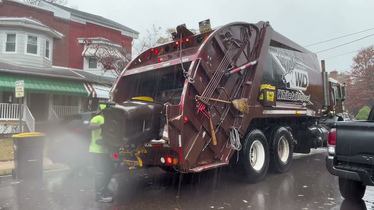 Whitetail Disposal Mack Mr Mcneilus rear loader ~77 on heavy rain recycling pickup 