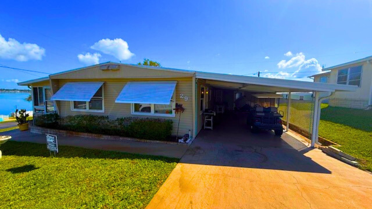 Дом стоимостью менее 700 долларов с прямым видом на воду (озеро Плэсид, Флорида)!