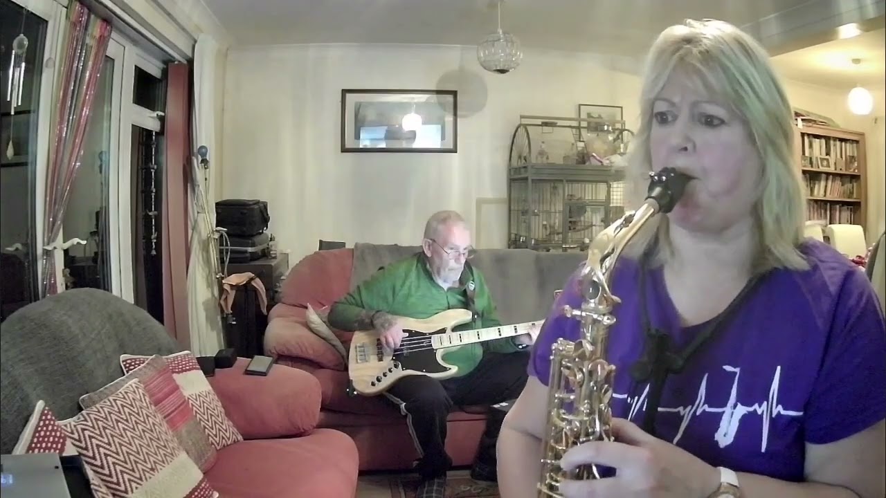Have you ever seen the rain -  Alto sax cover using the Tomplay app, Martin on the bass. 