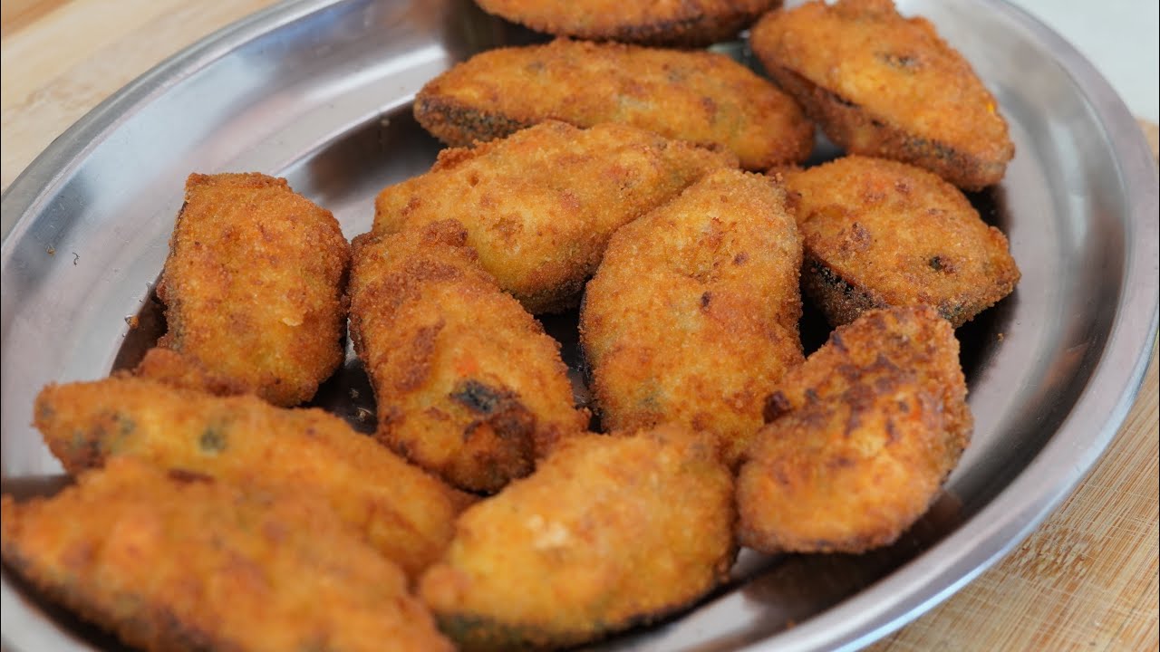 Mejillones tigre rellenos de bechamel con langostinos
